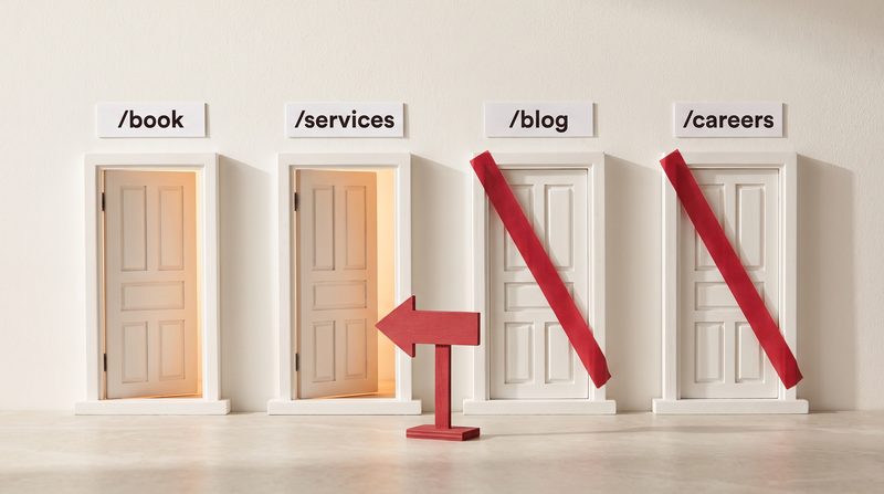 Four small doors labelled /book, /services, /blog and /careers: the first two open and lit, the last two taped shut in crimson, with a crimson arrow sign in front